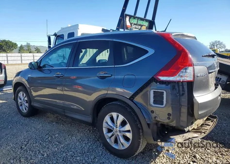 2013 Honda Cr-V Exl z USA, uszkodzony, nr VIN 2HKRM4H7XDH668773